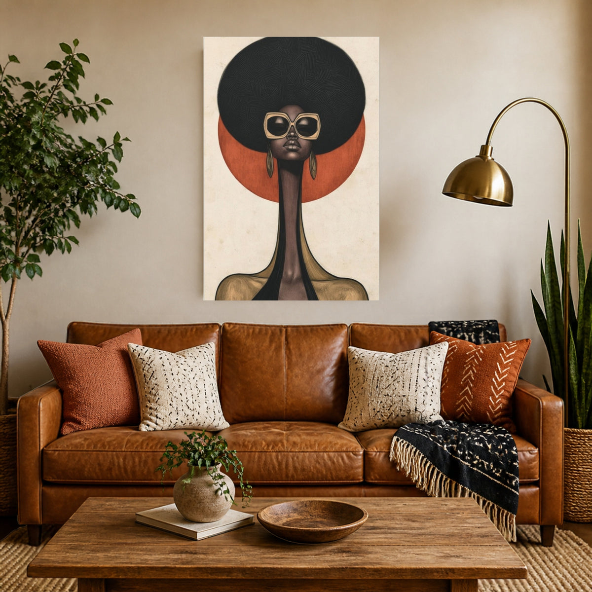 Sun Queen canvas above a cognac leather sofa in a warm living room